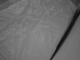voyeurcam-julmodels-whitebed-1 webcam model stream image