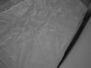 voyeurcam-julmodels-whitebed-1 webcam model stream image