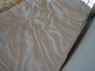 voyeurcam-julmodels-whitebed-1 webcam model stream image