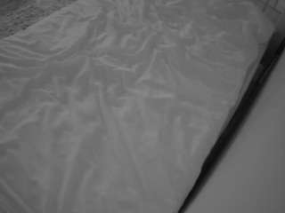 voyeurcam-julmodels-whitebed-1 webcam model stream image