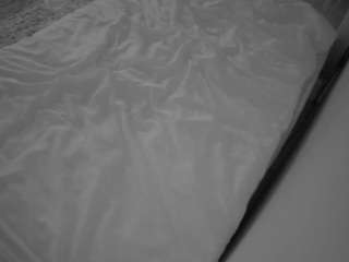 voyeurcam-julmodels-whitebed-1 webcam model stream image