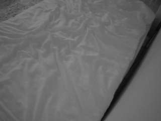voyeurcam-julmodels-whitebed-1 webcam model stream image