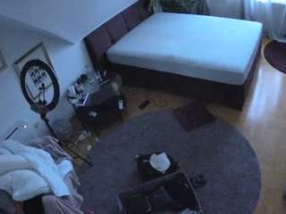 voyeurcam-julmodels-whitebed-4 webcam model stream image